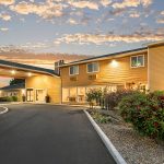 Entrance of Quality Inn & Suites Albany at Dusk