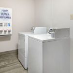 Guest Laundry with Washer and Dryer at Quality Inn & Suites Albany